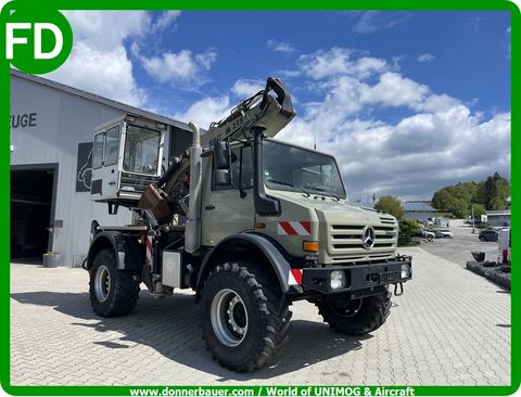 Unimog U5000 mit Kran, Pritsche , Bagger 