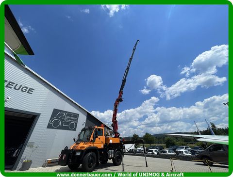 Unimog U400 mit HMF 1823 Mega Kran 