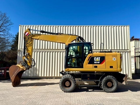 CAT M318F / 9.852 H / Deutsche Maschine
