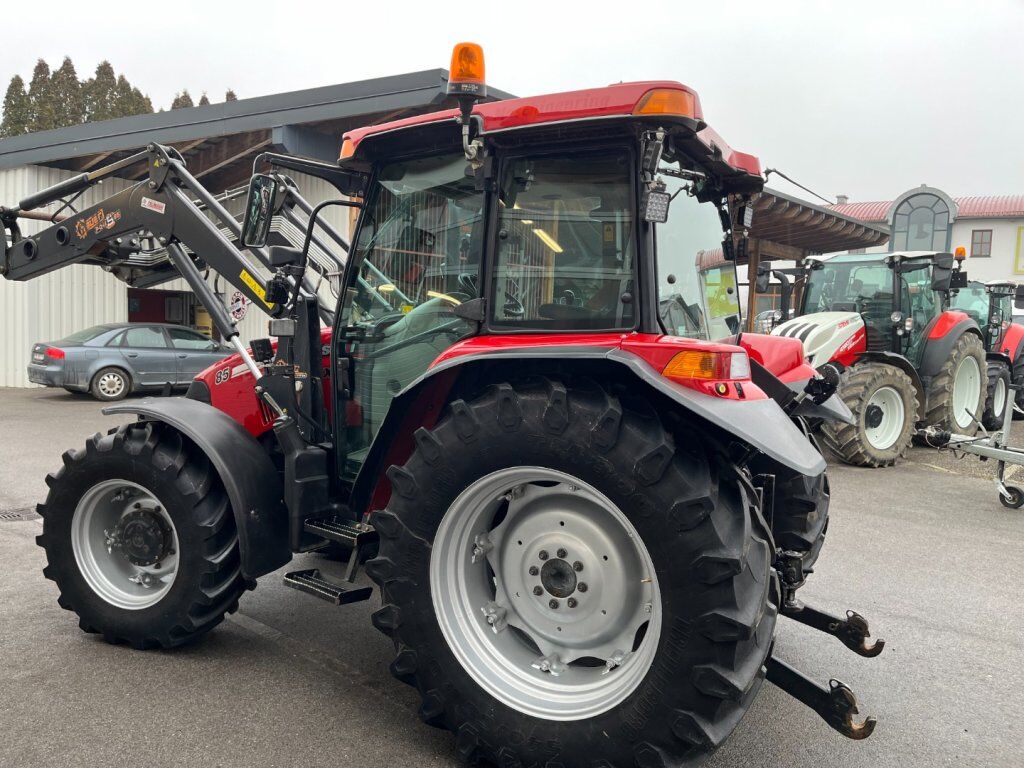 Case IH JXU 85 + Frontlader Hauer + Pfegebereifung 2