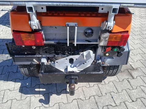 Holder C 240 mit Scheefräse, Schneeschild und Sichelmäh