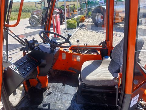 Holder C 240 mit Scheefräse, Schneeschild und Sichelmäh