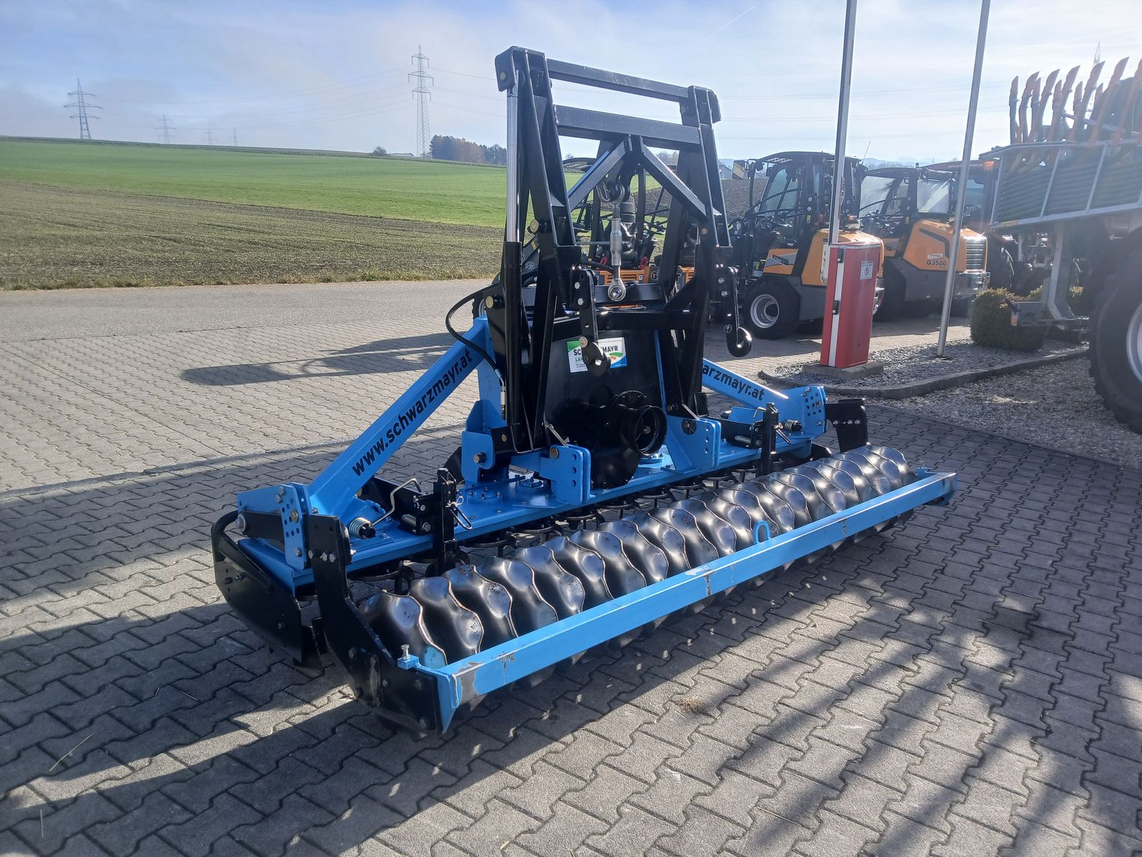 Sicma ERS 3000 mit AXON-Walze und hydr. Anbauteilen 3