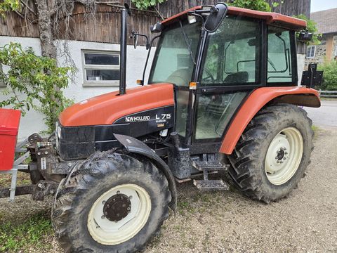 New Holland L75 mit FH,FZW