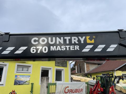Country 70S mit 670 Kran Master