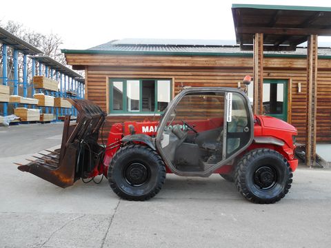 Manitou MT 523 mit Greiferschaufel und Mistgabel 