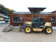 New Holland LM732 mit Schaufel und Gabel  