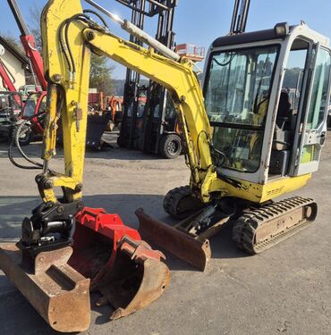 Takeuchi TB 016 - neuer POWERTILT + 3 Stk. Löffel