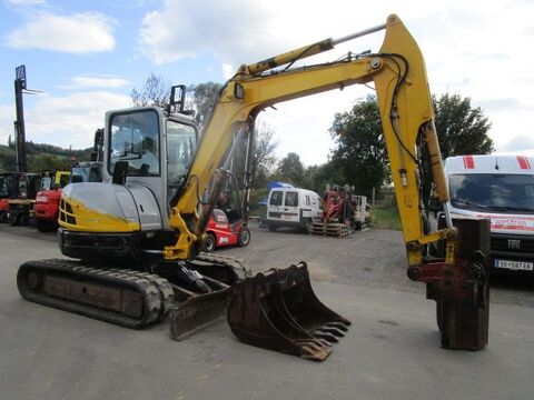 New Holland  E50.2 (4,9 T) mit POWERTILT + hydr. Schnellwechs