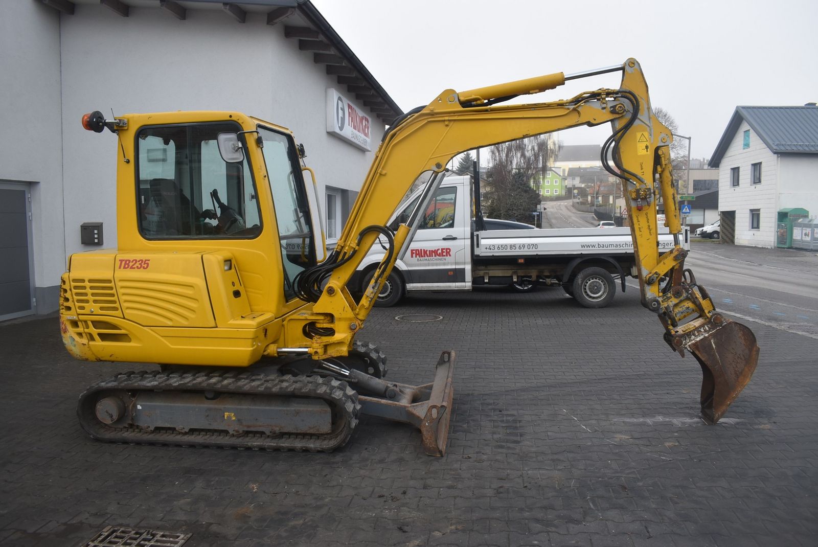 Takeuchi TB235 mit Powertilt 2