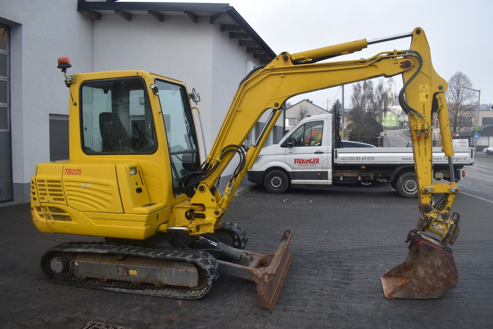 Takeuchi TB235 mit Powertilt 2