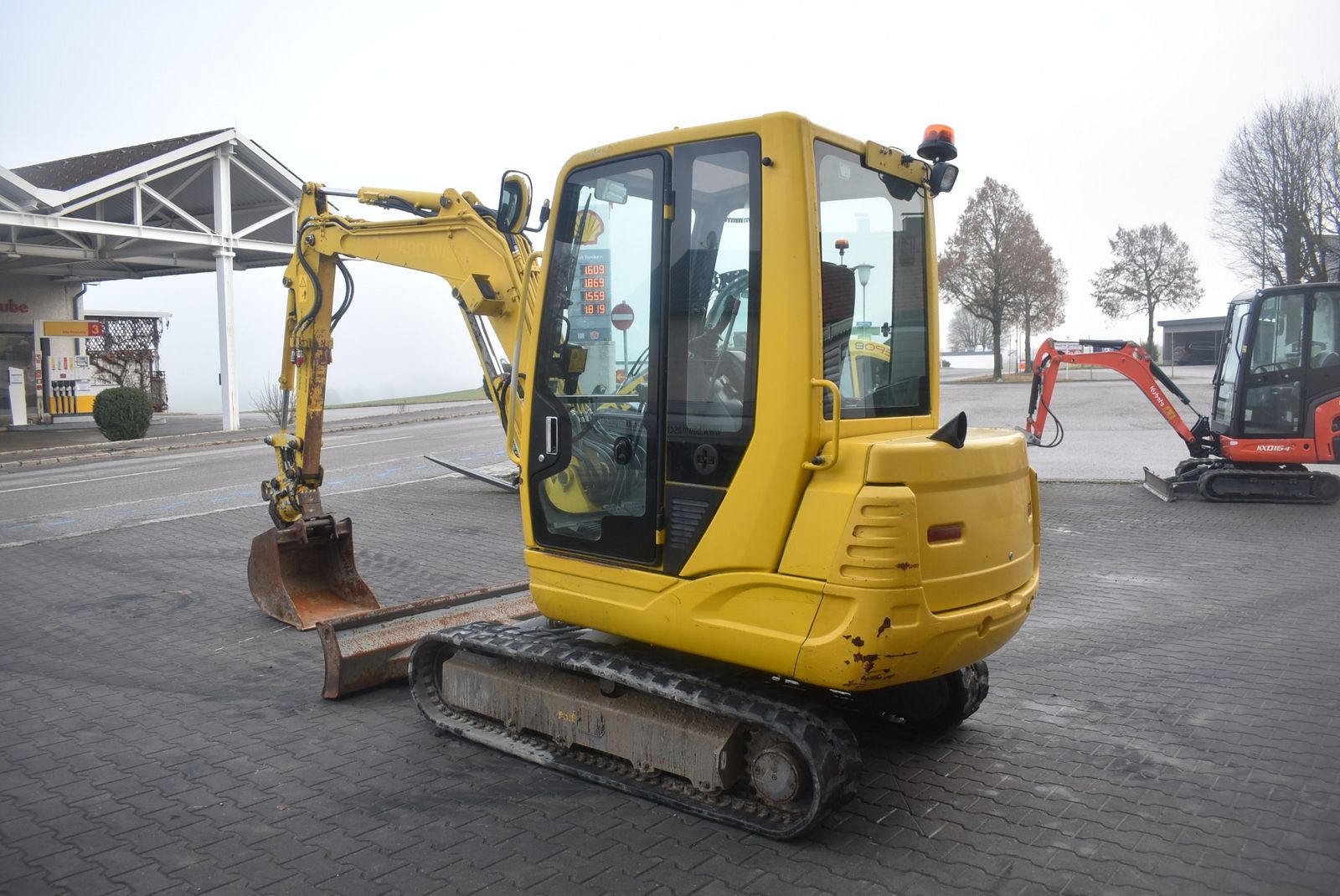 Takeuchi TB235 mit Powertilt 3