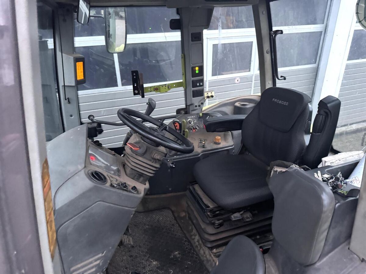 Claas ARES 557 ATZ + Stoll F30 HDPM 3