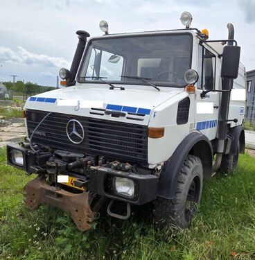 Mercedes Unimog 1400 +Schmidt SK320 2