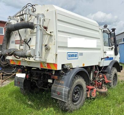 Mercedes Unimog 1400 +Schmidt SK320 3