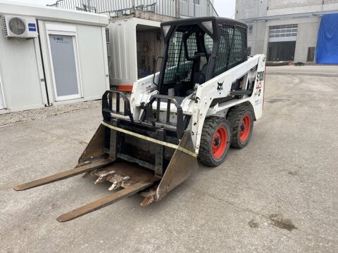 Bobcat S100 mit Schaufel und Gabel 1